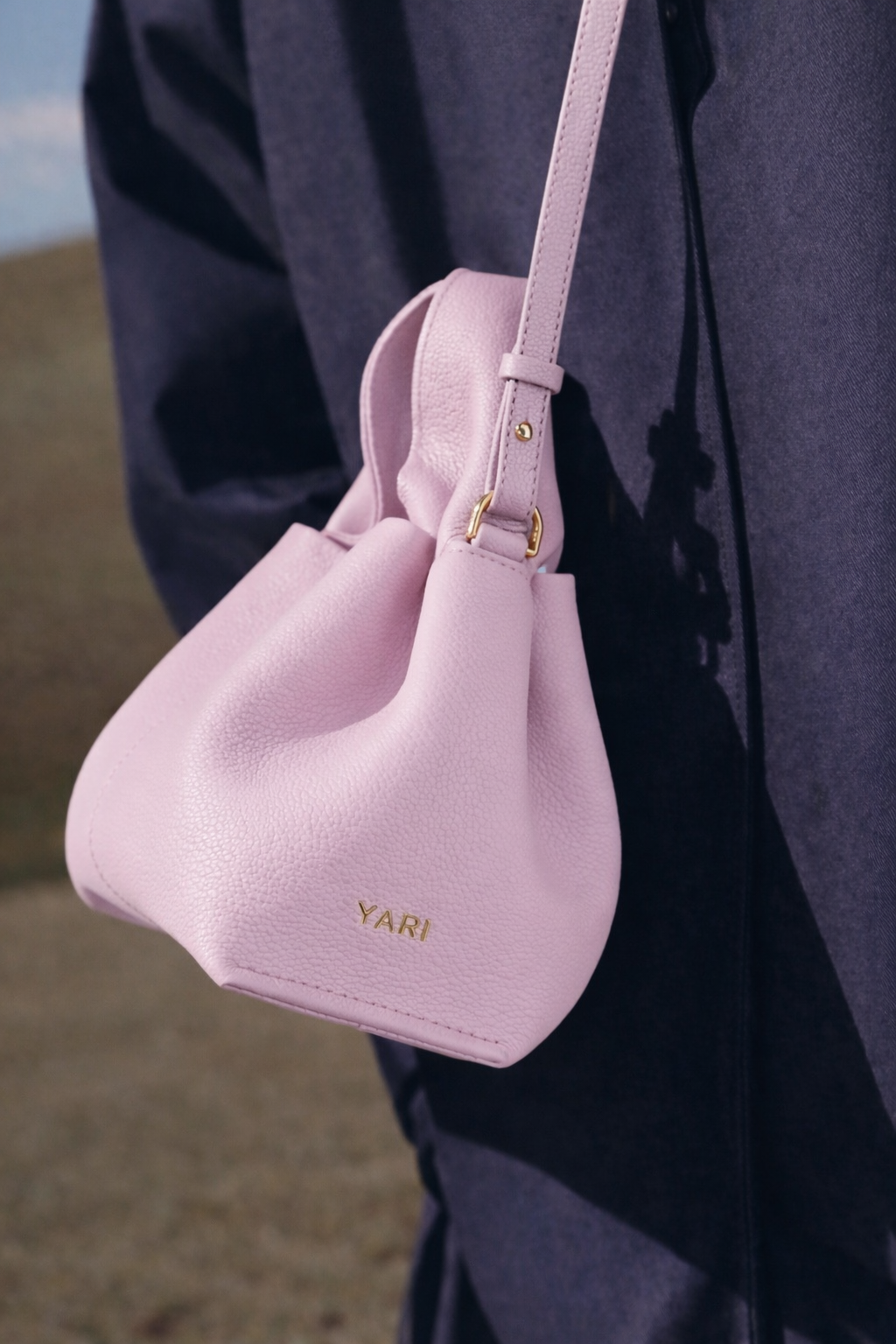 Modern Minimalist Editorial Look Featuring Draped Sage Grey Tailoring with Structured Soft Lilac Leather Crossbody Top Handle Handbag – Elegant Quiet Luxury Womenswear Fashion Style