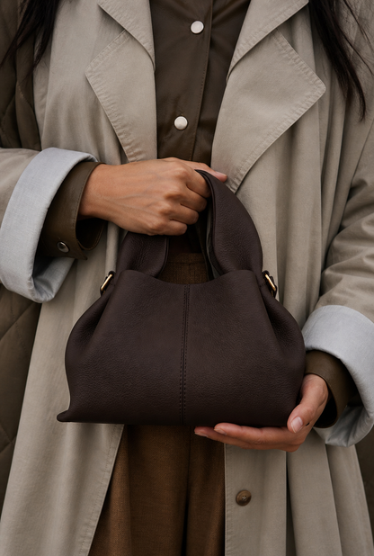 Moody Minimalist Outdoor Look Featuring Monochrome Plum Knit Layering and Tailored Trousers with Structured Espresso Brown Leather Top Handle Handbag – Sophisticated Quiet Luxury Womenswear Editorial Style