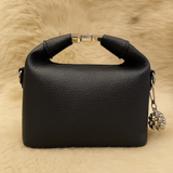 Elegant Black Soft-Texture Sling Bag with Metal Logo & Premium Charm Accent
