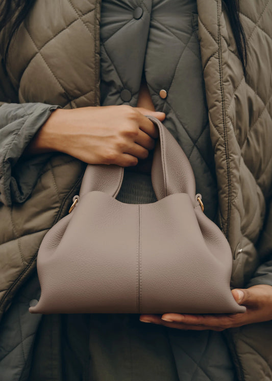Elegant Soft-Structured Pebbled Leather Shoulder Handbag in Taupe Gray with Sculpted Silhouette, Minimalist Design, and Everyday Luxe Carryall Appeal