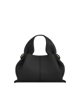 Sophisticated Minimalist Trench Coat Ensemble Featuring Oversized Stone Beige Outerwear and Layered Neutral Tailoring with Structured Black Leather Top Handle Handbag – Modern Quiet Luxury Womenswear Editorial Look