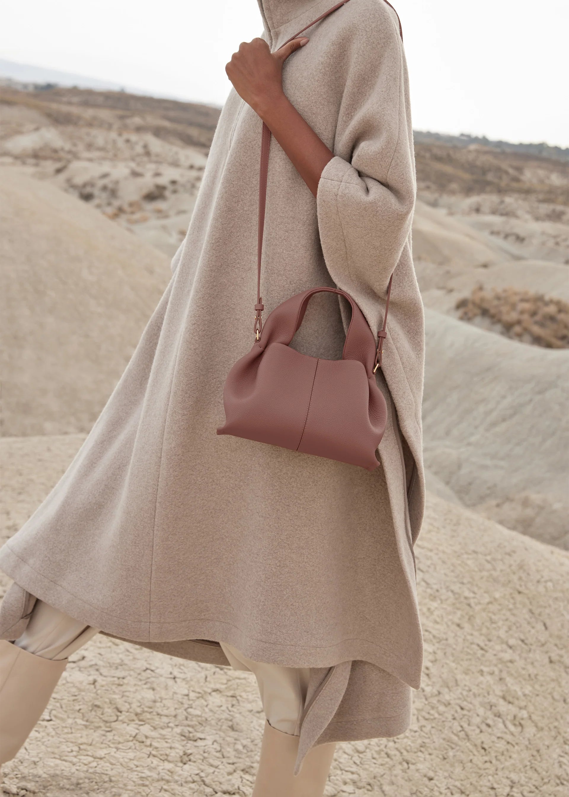 Elegant Minimalist Taupe Wool Cape Outfit with Structured Dusty Rose Leather Crossbody Handbag – Timeless Neutral Luxury Fashion Editorial Look for Autumn/Winter Womenswear