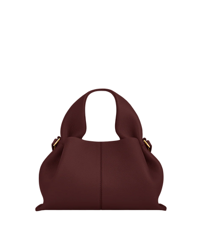 Refined Minimalist Winter Outfit Featuring Soft Ivory Textured Coat and Cream Tailored Trousers with Deep Burgundy Leather Crossbody Top Handle Handbag – Elegant Quiet Luxury Womenswear Editorial Style