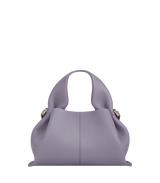 Elegant Minimalist Resort Look Featuring Flowing Ivory Tunic Dress and Draped Neutral Layers with Structured Soft Lilac Leather Top Handle Handbag – Modern Quiet Luxury Womenswear Editorial Style