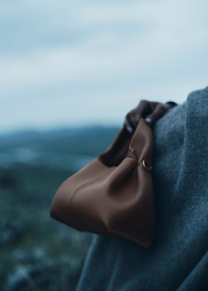 Moody Minimalist Autumn Look Featuring Charcoal Grey Knit Dress and Draped Wool Scarf with Structured Espresso Brown Leather Crossbody Handbag – Elegant Quiet Luxury Womenswear Editorial Style