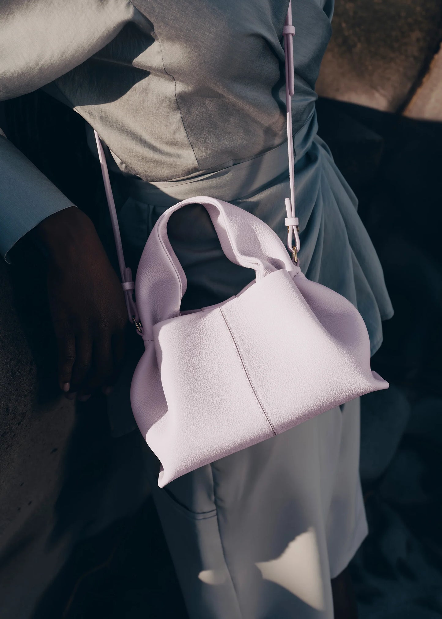 Modern Minimalist Editorial Look Featuring Draped Sage Grey Tailoring with Structured Soft Lilac Leather Crossbody Top Handle Handbag – Elegant Quiet Luxury Womenswear Fashion Style