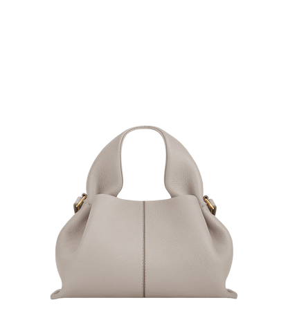 Elegant Winter Minimalist Look Featuring Rich Chocolate Wool Coat and Textured Knit Sleeves with Structured Stone Beige Leather Top Handle Handbag – Timeless Quiet Luxury Womenswear Editorial Style