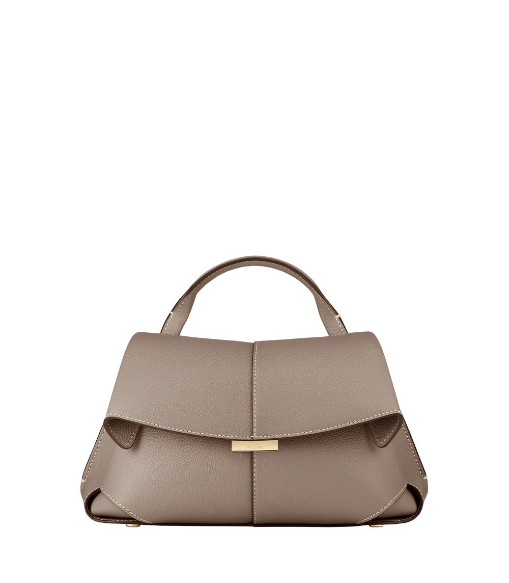 Taupe Leather Top-Handle Shoulder Bag Styled on Model in Neutral Sleeveless Dress