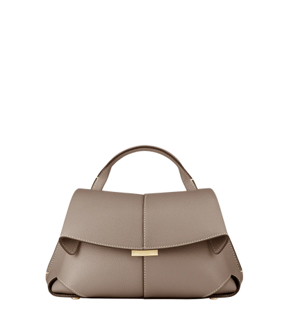 Taupe Leather Top-Handle Shoulder Bag Styled on Model in Neutral Sleeveless Dress