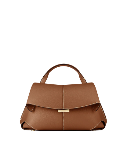 Elegant Tan Pebbled Leather Top-Handle Mini Handbag with Fold-Over Flap and Gold-Tone Hardware Styled with Neutral Knit Ensemble