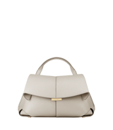 Elegant Ivory Pebbled Leather Top-Handle Shoulder Bag with Fold-Over Flap and Adjustable Strap Styled in Cozy Knitwear Portrait