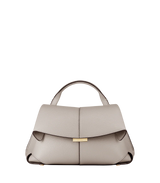 Elegant Taupe Pebbled Leather Top-Handle Crossbody Bag with Fold-Over Flap and Adjustable Strap Styled with Oversized Chunky Knit Sweater