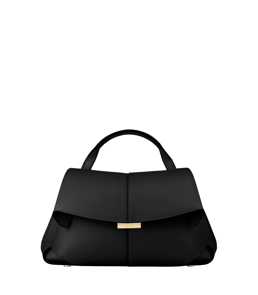 Elegant Black Pebbled Leather Top-Handle Shoulder Bag with Fold-Over Flap, Adjustable Strap, and Gold-Tone Hardware Styled in Minimalist Resort Look