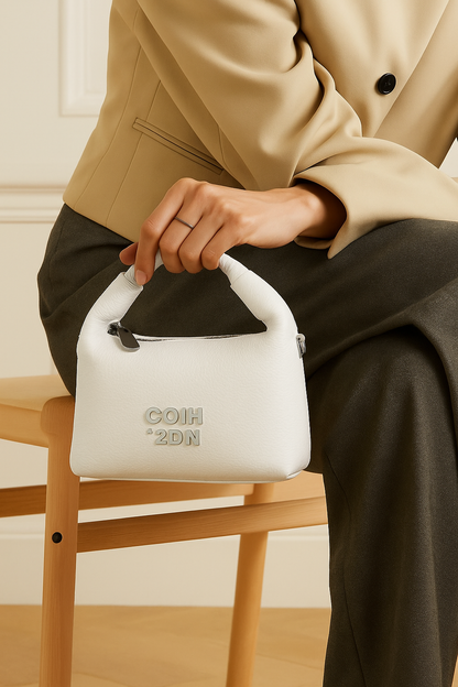 Luxury White Soft-Texture Sling Bag with Metal Logo & Premium Charm Detail
