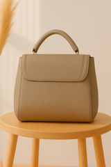 Premium Beige Textured Handbag with Golden Lock Closure